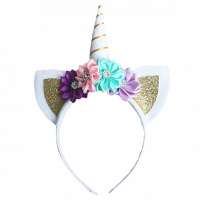 Carnaval unicorn diadeem hoorntje wit / goud met oortjes en bloemen