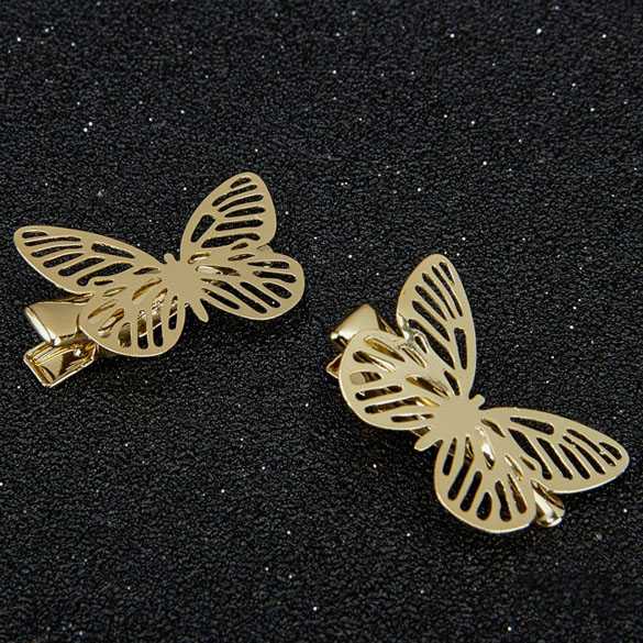Haarversiering vlinder clip 2 stuks kleur goud